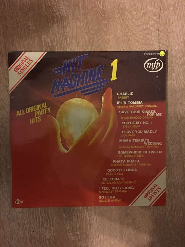Hit Machine 1 - Original Singles - Vinyl LP Record - Opened  - Very-Good+ Quality (VG+)