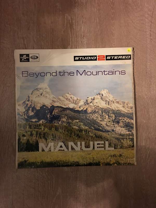 Manuel - Beyond The Mountains - Vinyl LP Record  - Opened  - Very-Good+ Quality (VG+)