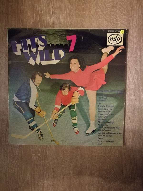 Hits Wild 7 - Vinyl LP Record - Opened  - Very-Good Quality (VG)