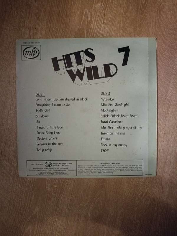 Hits Wild 7 - Vinyl LP Record - Opened  - Very-Good Quality (VG)