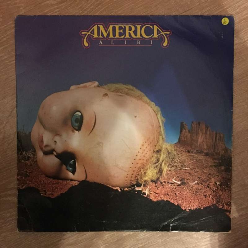 America  - Alibi -  Vinyl LP Record - Opened  - Very-Good Quality (VG)