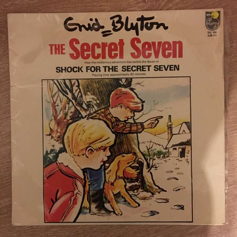 Enid Blyton - The Shock For The Secret Seven - Vinyl LP Record - Opened  - Very-Good- Quality (VG-)