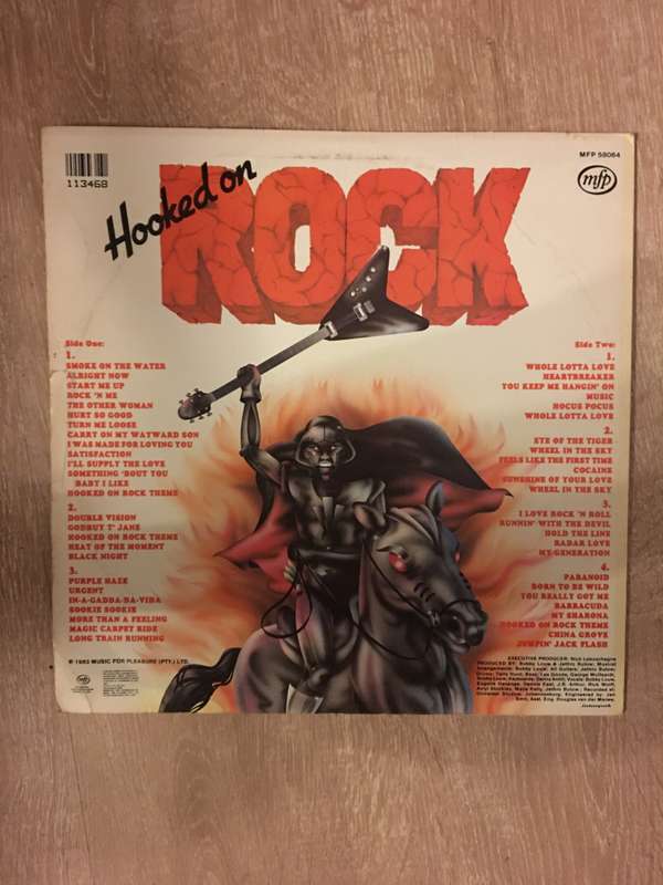 Hooked On Rock - Iron Fist - Vinyl LP Record - Opened  - Very-Good Quality (VG)