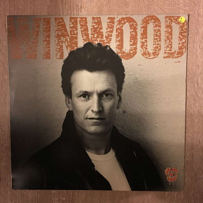 Steve Winwood  Roll With It - Vinyl Record - Opened  - Very-Good Quality (VG)
