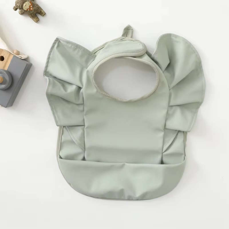 Ruffle bib - Sage