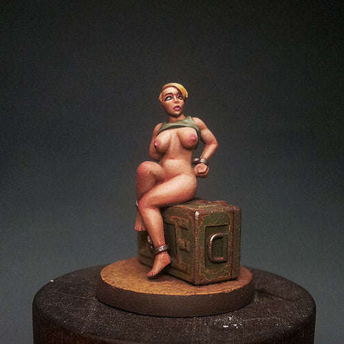 28mm chained girl sitting on ammo box (Miniatures)