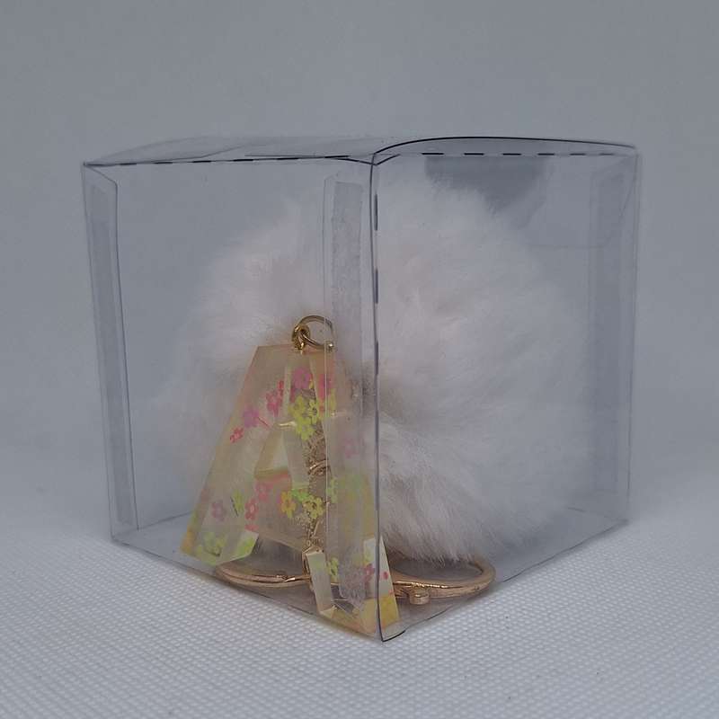 Custom Resin Letter Keychain With a White Pom Pom - A