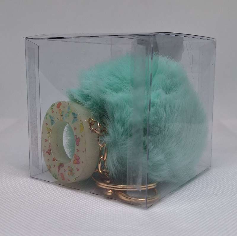 Custom Resin Letter Keychain With a Turquoise Pom Pom - O