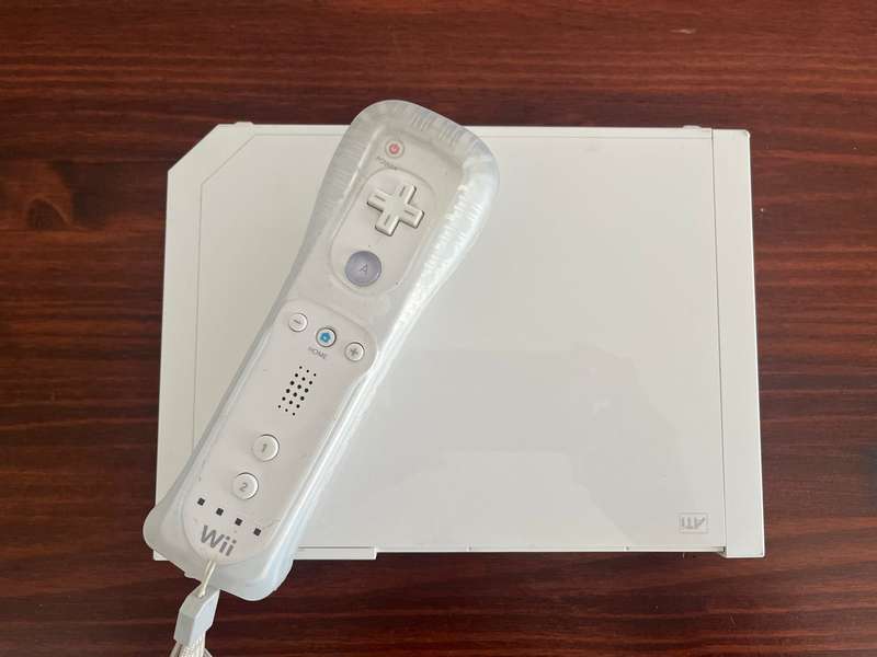 Nintendo Wii with controller, charger, etc.