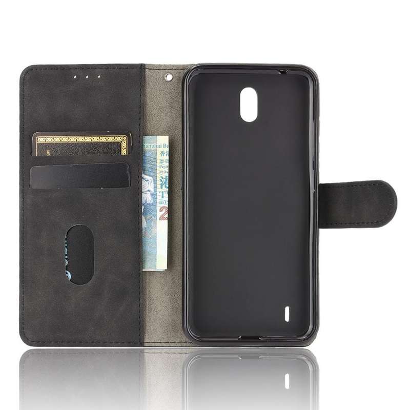 For Nokia C2 Solid Color Skin Feel Magnetic Buckle Horizontal Flip Calf Texture PU Leather Case w...