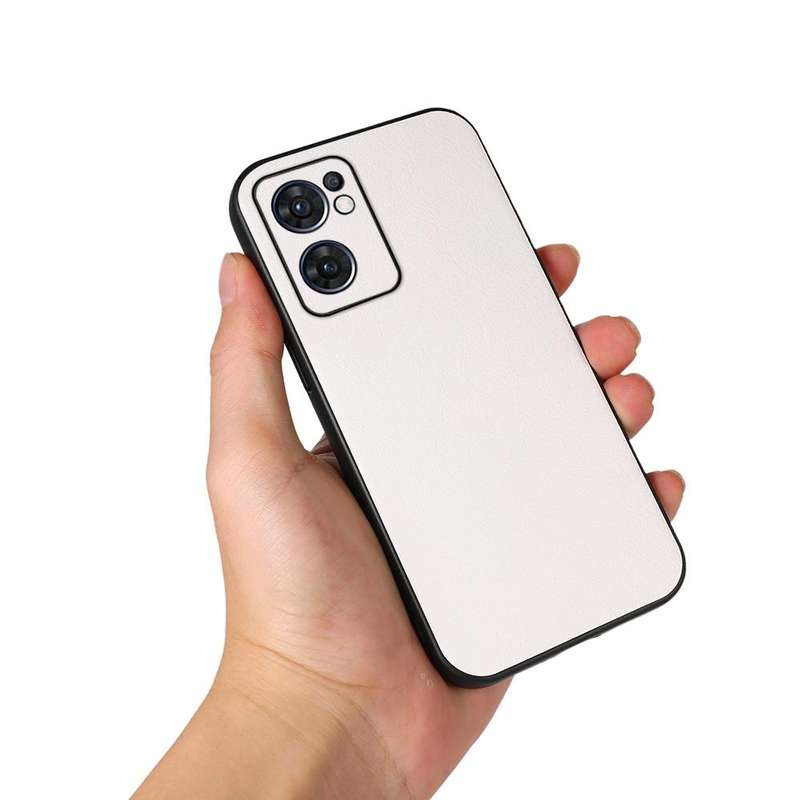 For OPPO Reno7 5G International Accurate Hole Two-color Litchi Texture PU Phone Case(Pink)