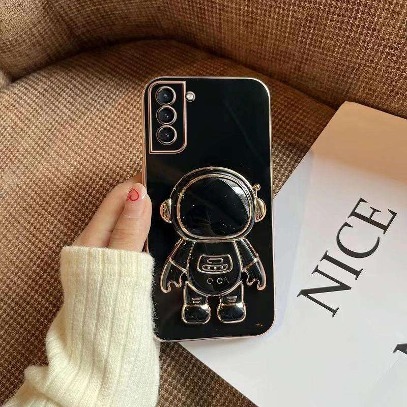 For Samsung Galaxy A23 Plating Astronaut Holder Phone Case(Black)