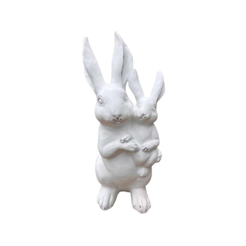 Large White Bunny With Kid On Lap