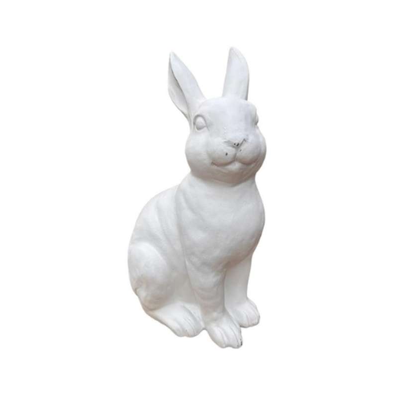 Small White Sitting Bunny Looking Right