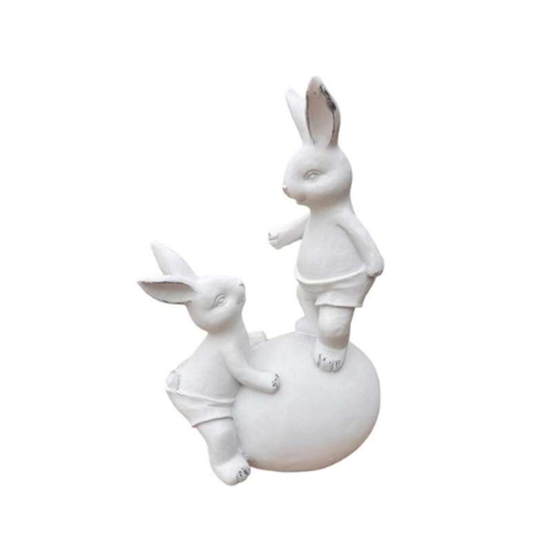 White Bunnies On Egg