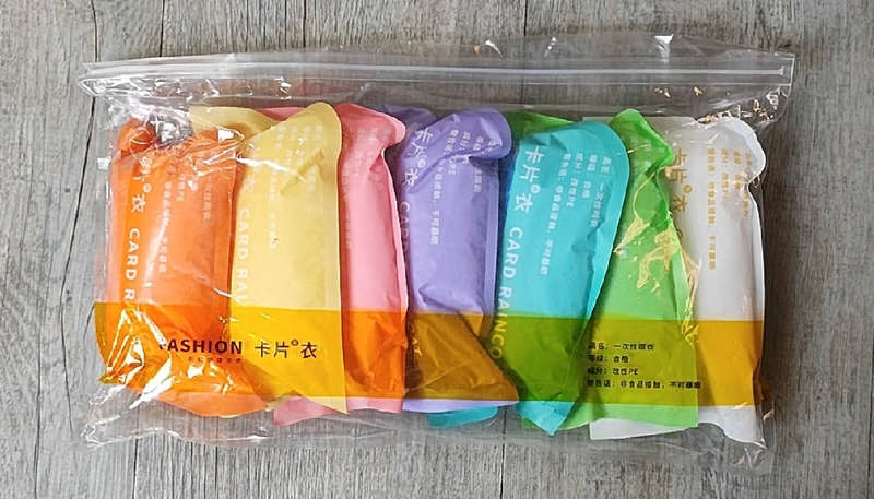 7Pack 1Piece Portable Disposable Multi-Color Travel Raincoat Set