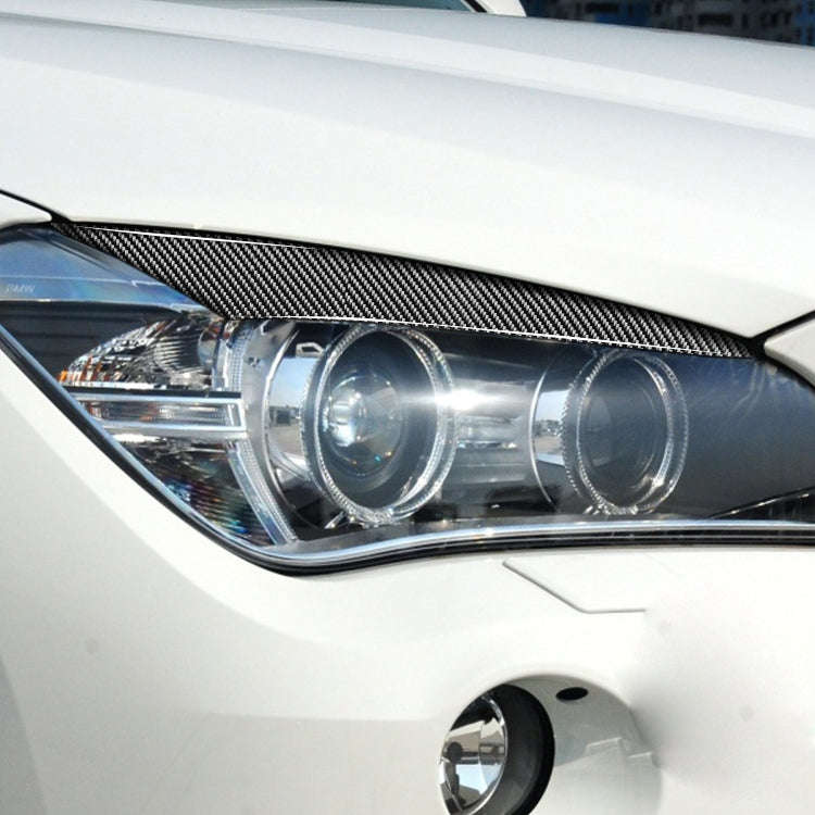 2 PCS / Set Carbon Fiber Car Lamp Eyebrow Decorative Sticker for BMW X1/E84 2009-2014, Drop Glue ...