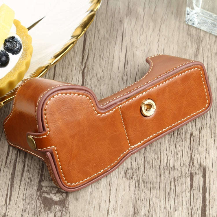 1/4 inch Thread PU Leather Camera Half Case Base for Sony ILCE-7RM4 / A7RM4 / A7R IV (Brown)