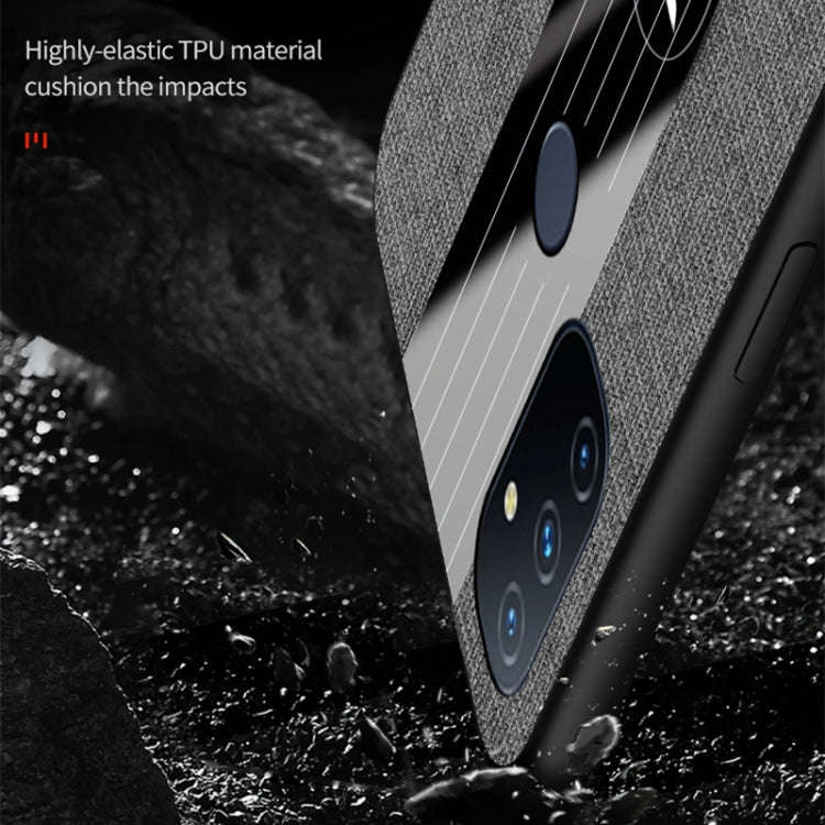 For OnePlus Nord N100 XINLI Stitching Cloth Texture TPU Phone Case with Ring Holder(Black)