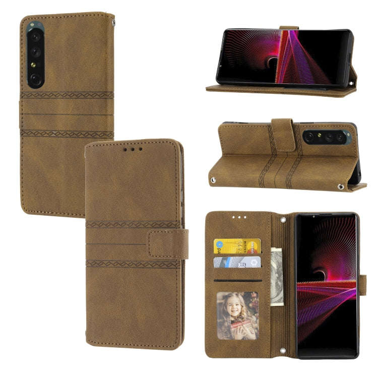 For Sony Xperia 1 IV Embossed Striped Magnetic Buckle Horizontal Flip Phone Leather Case(Brown)