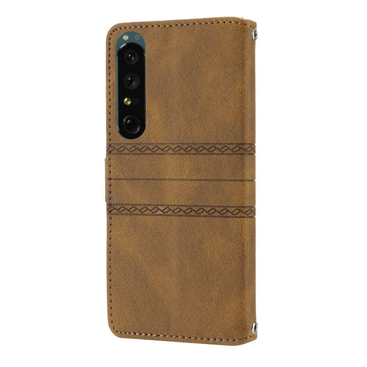 For Sony Xperia 1 IV Embossed Striped Magnetic Buckle Horizontal Flip Phone Leather Case(Brown)