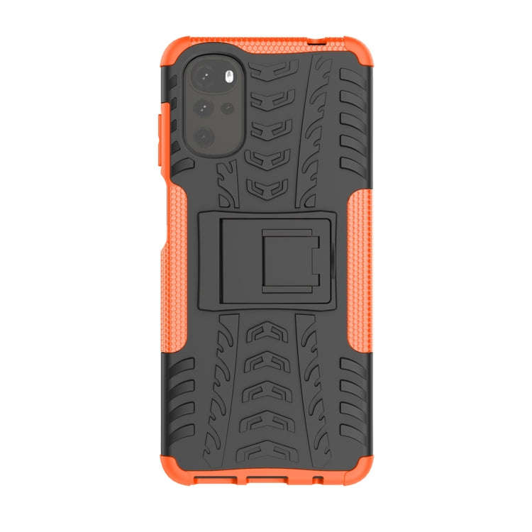 For Motorola Moto G22/E32 Tire Texture TPU + PC Phone Case with Holder(Orange)