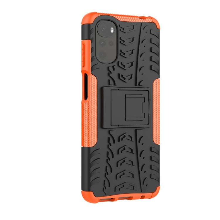 For Motorola Moto G22/E32 Tire Texture TPU + PC Phone Case with Holder(Orange)
