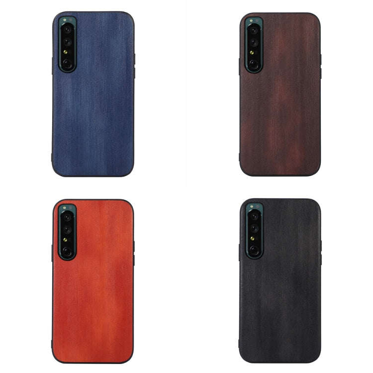 For Sony Xperia 1 IV Yellow Cow Texture PU Phone Case(Black)