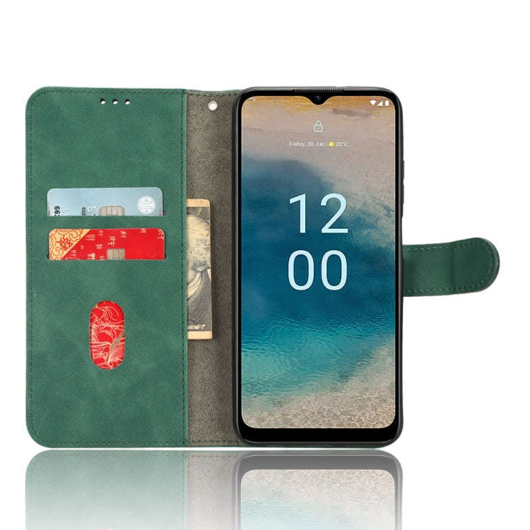 For Nokia G22 Skin Feel Magnetic Flip Leather Phone Case(Green)