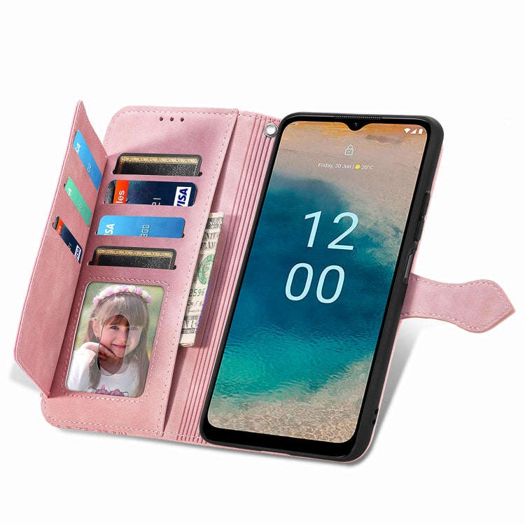 For Nokia G22 Embossed Flower Zipper Leather Phone Case(Pink)