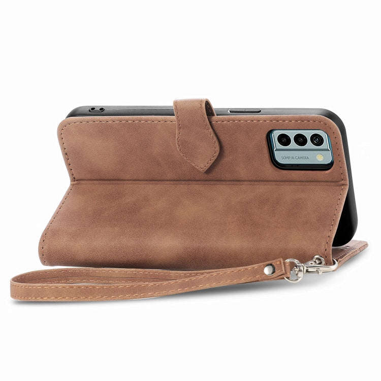 For Nokia G22 Embossed Flower Zipper Leather Phone Case(Brown)