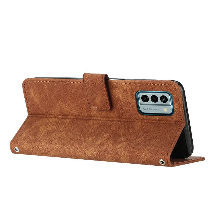For Nokia G22 Skin Feel Stripe Pattern Leather Phone Case with Lanyard(Brown)