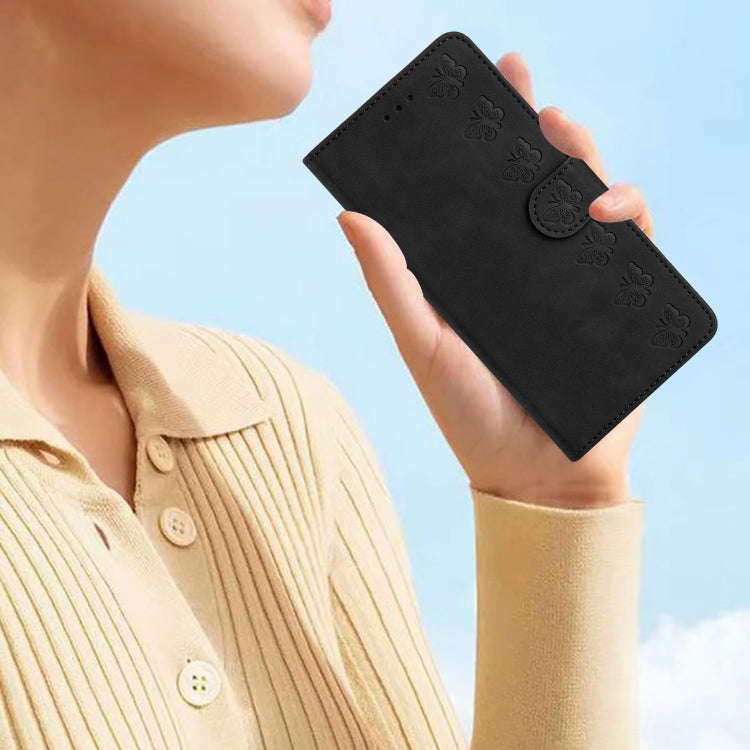 For Motorola Edge 50 5G Seven Butterflies Embossed Leather Phone Case(Black)