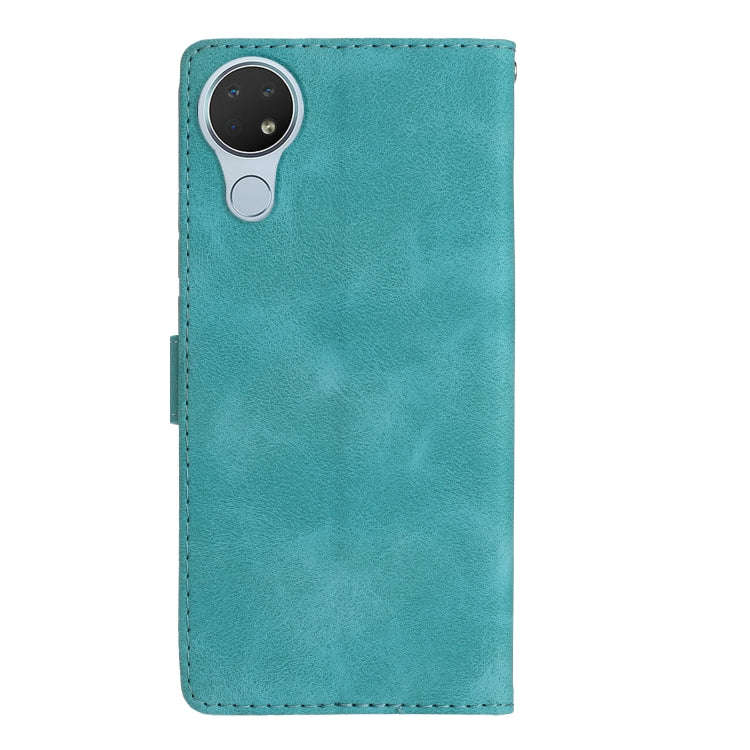 For Nokia 6.2 / 7.2 Flower Butterfly Embossing Pattern Leather Phone Case(Sky Blue)
