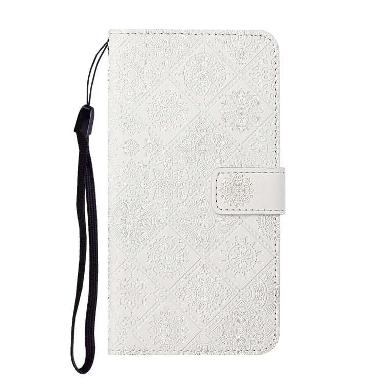 For Google Pixel 9 / 9 Pro Ethnic Style Embossed Pattern Leather Phone Case(White)