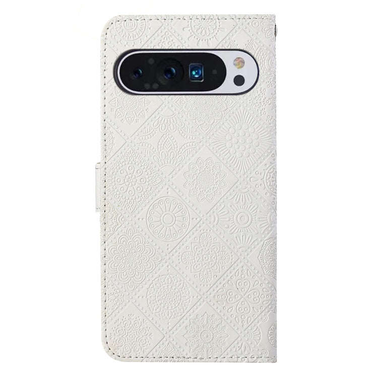 For Google Pixel 9 / 9 Pro Ethnic Style Embossed Pattern Leather Phone Case(White)