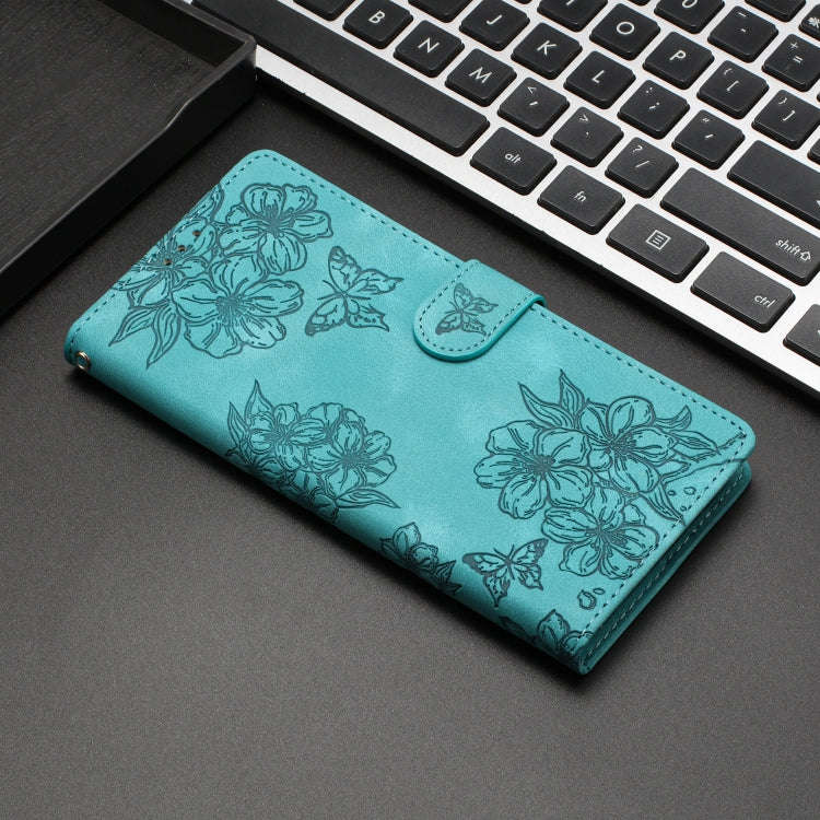 For Motorola Edge 50 Pro Cherry Blossom Butterfly Skin Feel Embossed PU Phone Case(Green)