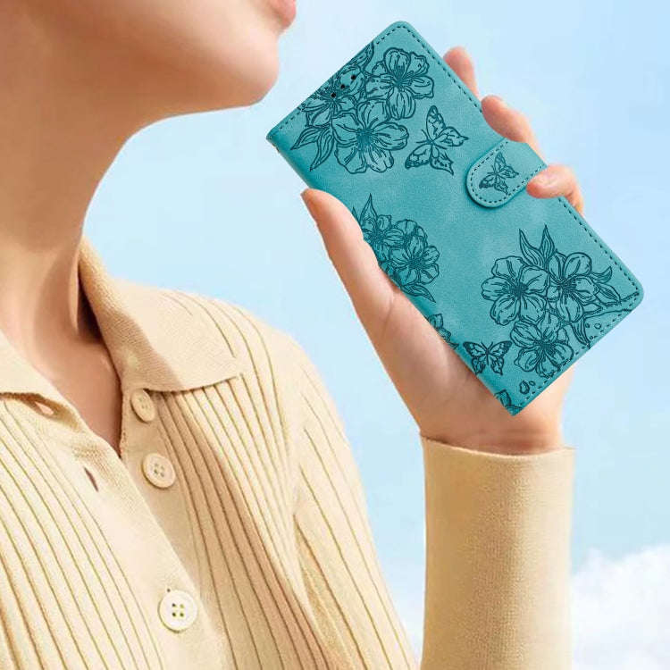 For Motorola Edge 50 Pro Cherry Blossom Butterfly Skin Feel Embossed PU Phone Case(Green)