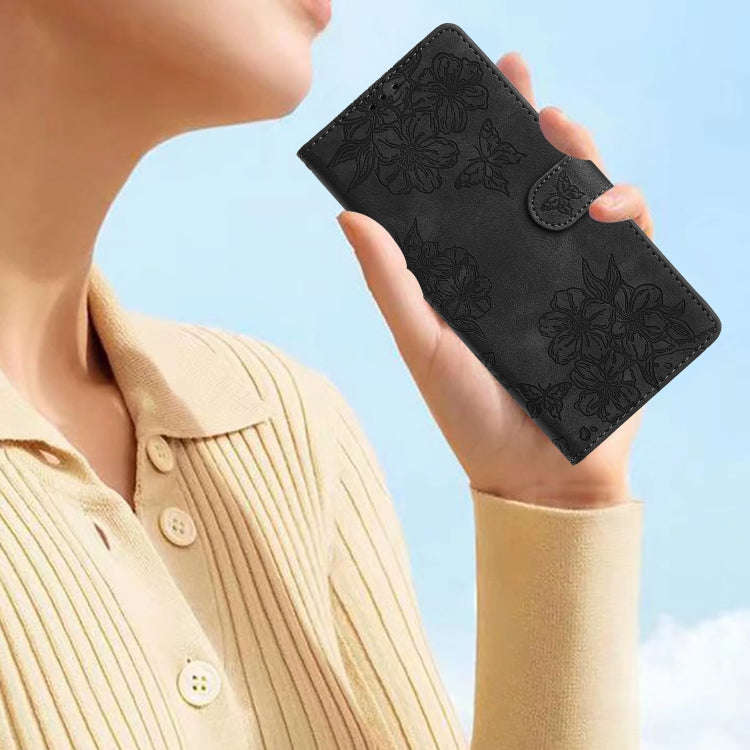 For Motorola Edge 50 Pro Cherry Blossom Butterfly Skin Feel Embossed PU Phone Case(Black)