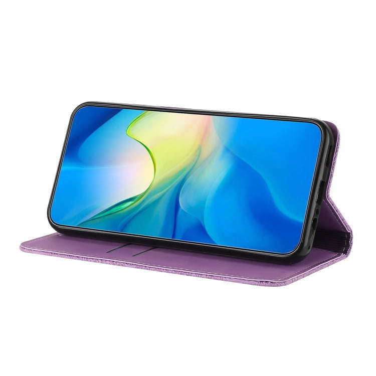 For Google Pixel 9 Pro XL Ethnic Embossed Adsorption Leather Phone Case(Purple)