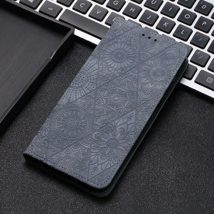 For Google Pixel 9 / 9 Pro Ethnic Embossed Adsorption Leather Phone Case(Grey)
