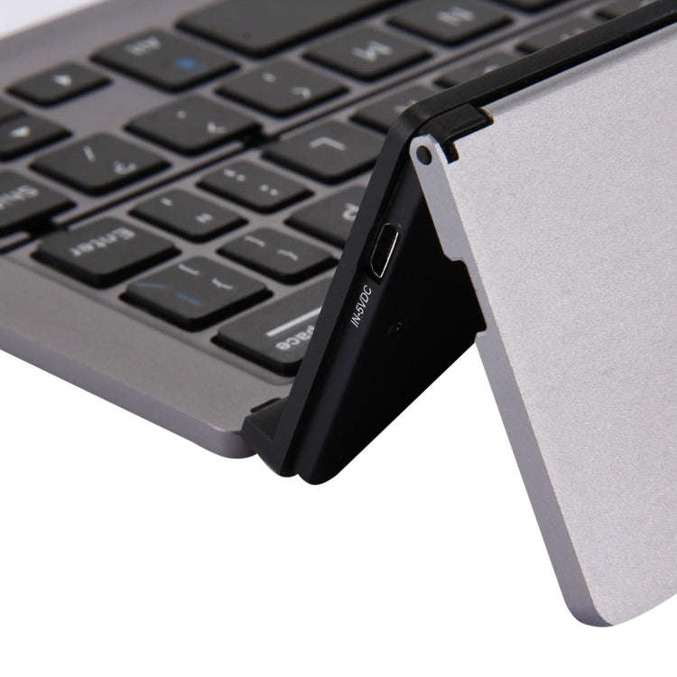 F18 Ultra-slim Rechargeable Foldable 58 Keys Bluetooth Wireless Keyboard with Holder (Grey)