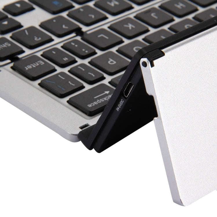 F18 Ultra-slim Rechargeable Foldable 58 Keys Bluetooth Wireless Keyboard with Holder (Silver)