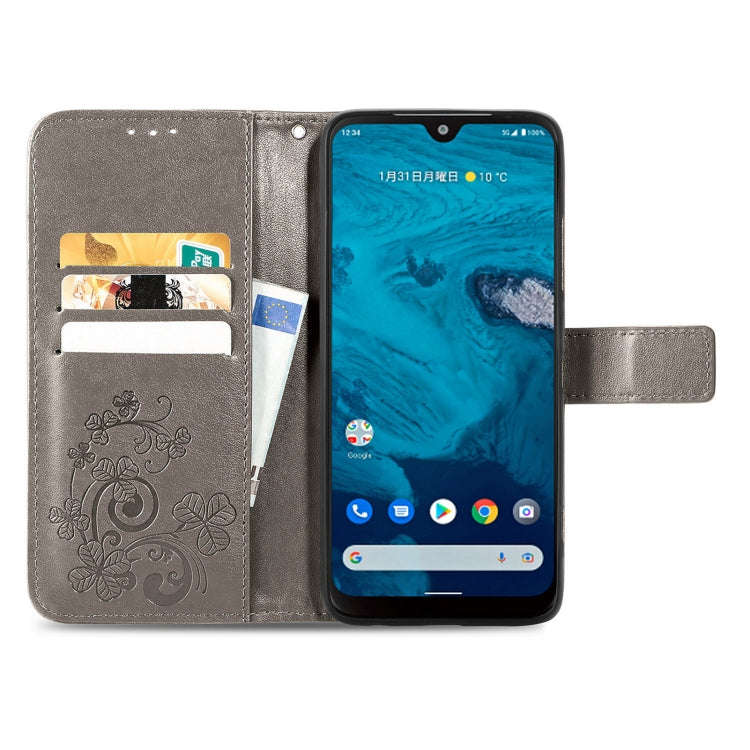For Kyocera Android One S10 Four-leaf Clasp Embossed Buckle Leather Phone Case(Gray)