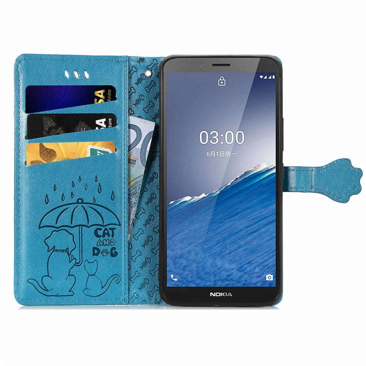 For Nokia C3 Cute Cat and Dog Embossed Flip Leather Phone Case(Blue)