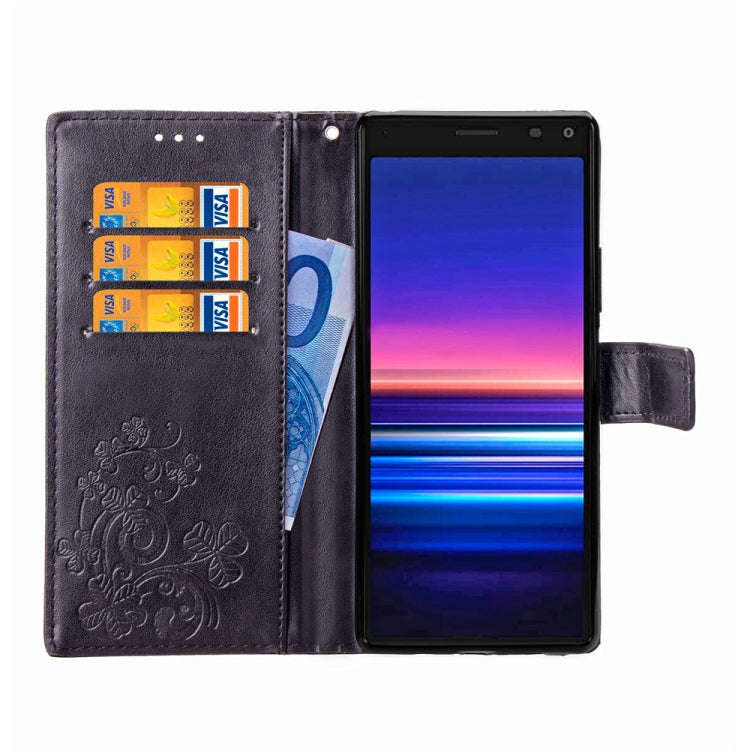 For Sony Xperia 20 Four-leaf Clasp Embossed Buckle Mobile Phone Protection Leather Case with Lany...