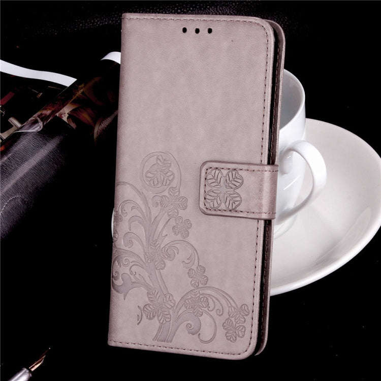 For Sony Xperia 20 Four-leaf Clasp Embossed Buckle Mobile Phone Protection Leather Case with Lany...