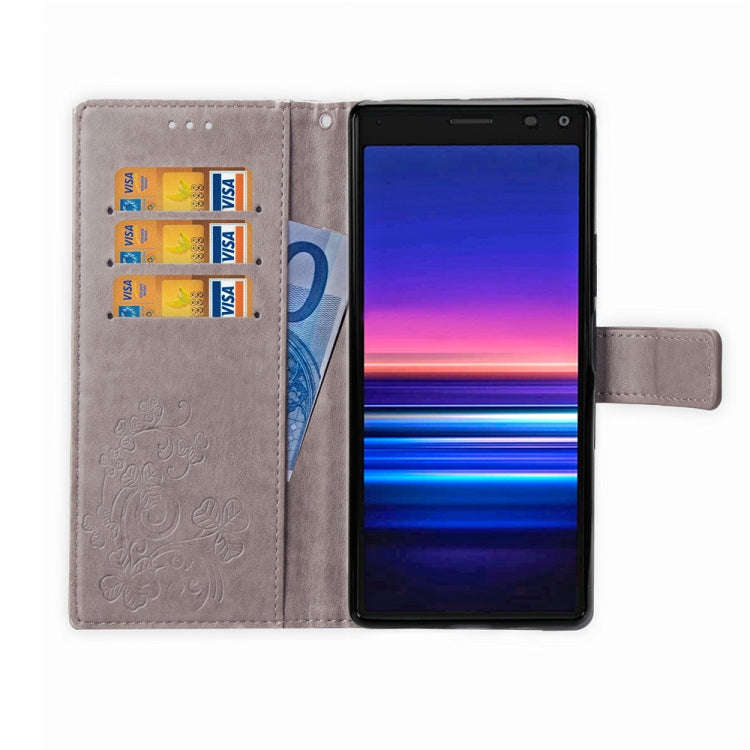 For Sony Xperia 20 Four-leaf Clasp Embossed Buckle Mobile Phone Protection Leather Case with Lany...
