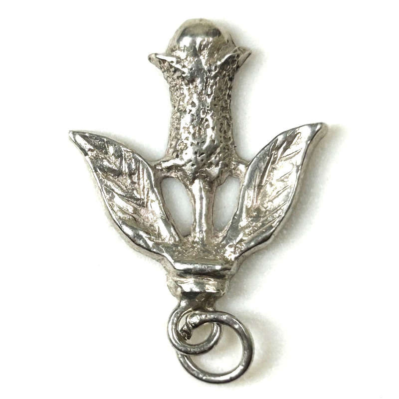 Miniature Silver Exotic Flower Charm Pendant
