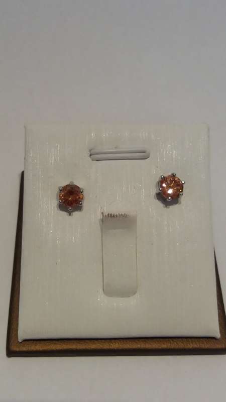 Silver Round cut orange zirconia stud earrings